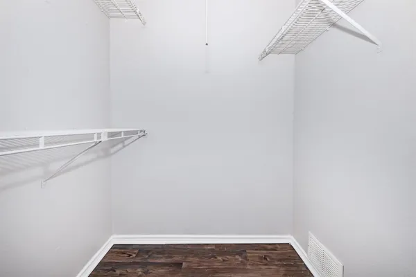 a view of a room with racks on the wall