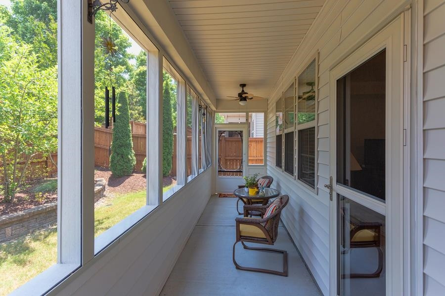 8612 Lasilla Way Raleigh, NC 27616 - Photo 20 of 27 A great spot to kick back and relax, or have a quiet meal al fresco. The storm door even has retractable glass to allow cool breezes into the house. Screened Porch