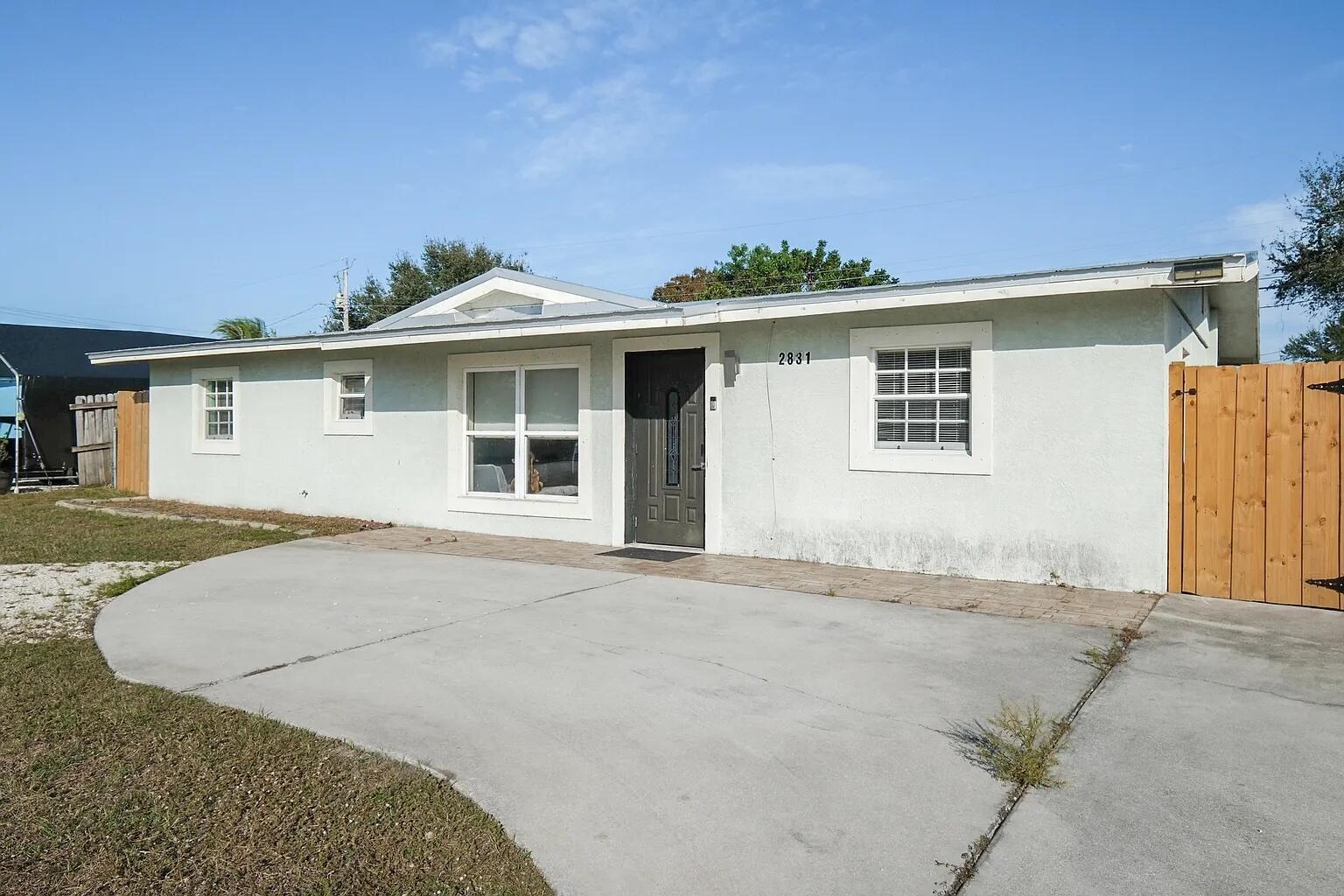 2831 Northeast Savannah Road Jensen Beach, FL 34957 - Photo 2 of 17 Front 2