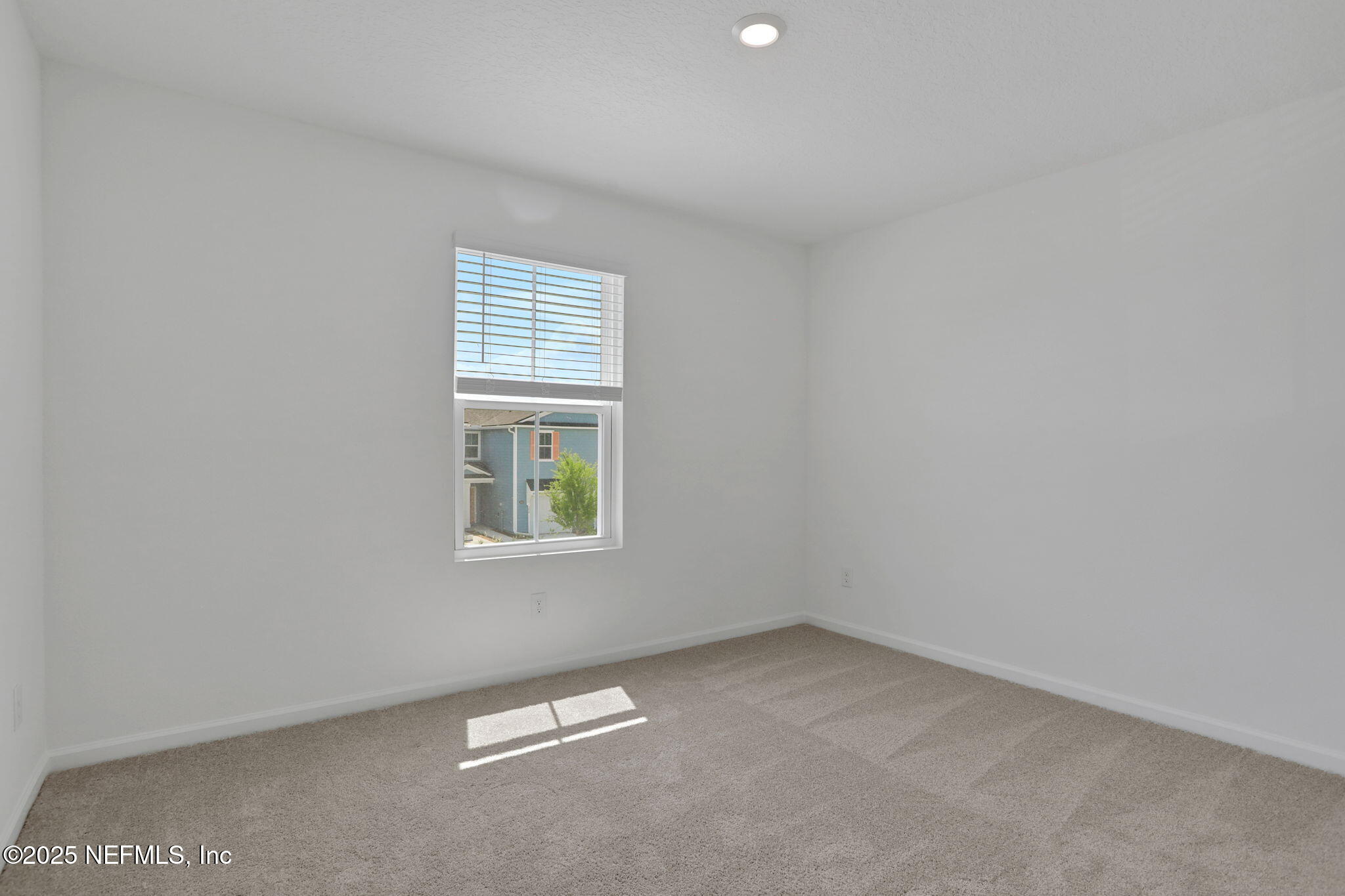 3769 Athenian Way Middleburg, FL 32068 - Photo 12 of 31 an empty room with a window