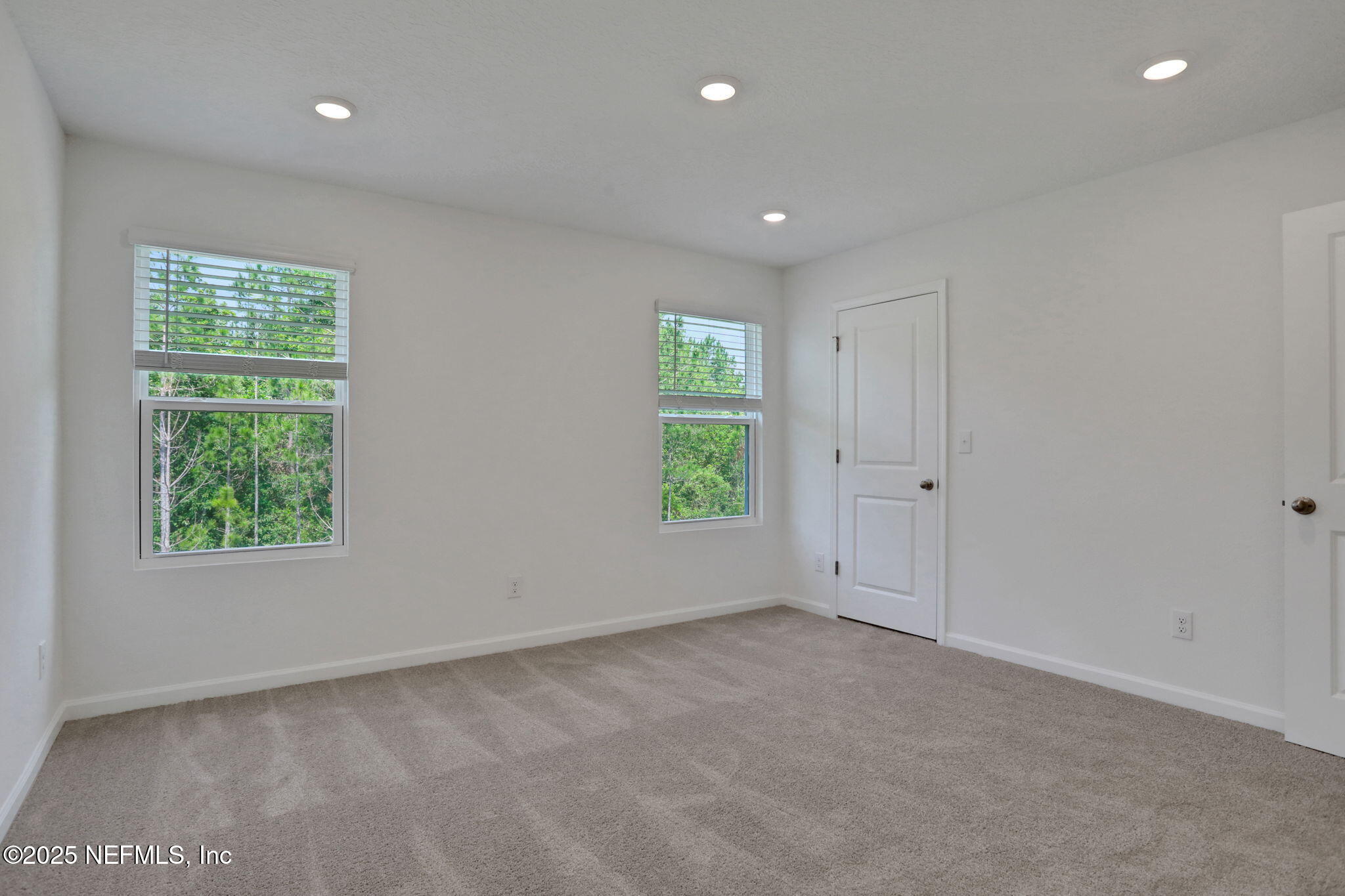 3769 Athenian Way Middleburg, FL 32068 - Photo 19 of 31 an empty room with windows