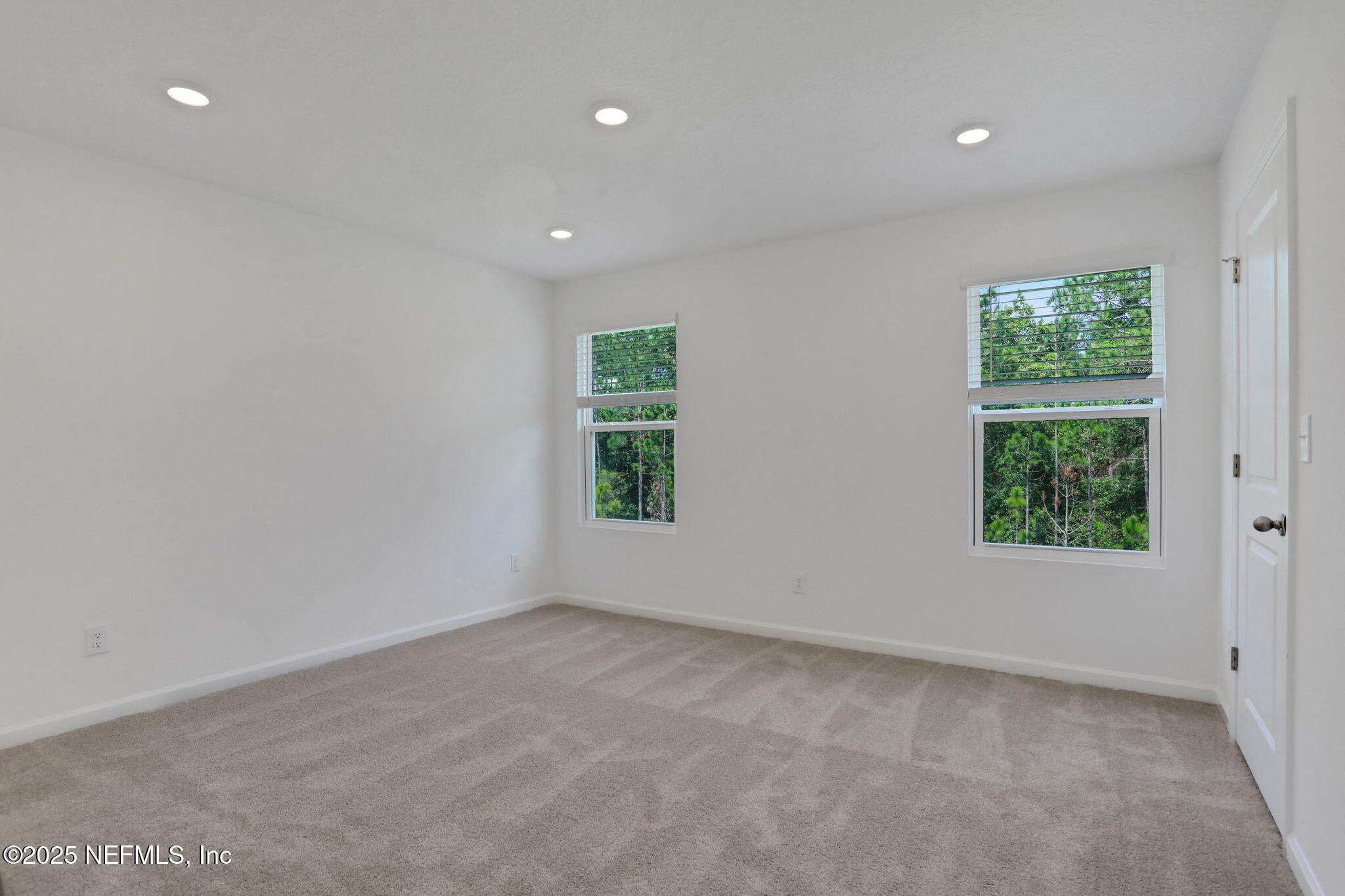 3769 Athenian Way Middleburg, FL 32068 - Photo 21 of 31 an empty room with windows
