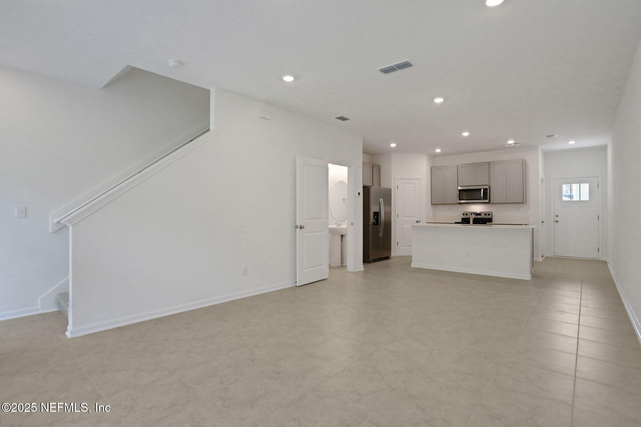 3769 Athenian Way Middleburg, FL 32068 - Photo 23 of 31 a view of a kitchen with a sink and a refrigerator