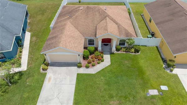 an aerial view of a house with garden