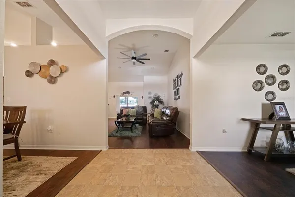 a living room with furniture and a table