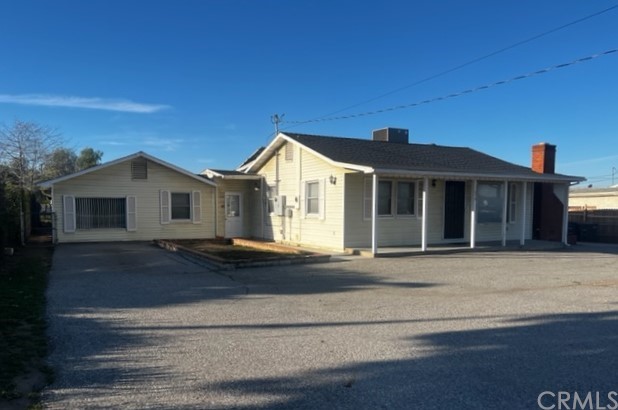 279 West County Line Road Calimesa, CA 92320 - Photo 1 of 1 a front view of a house with a yard
