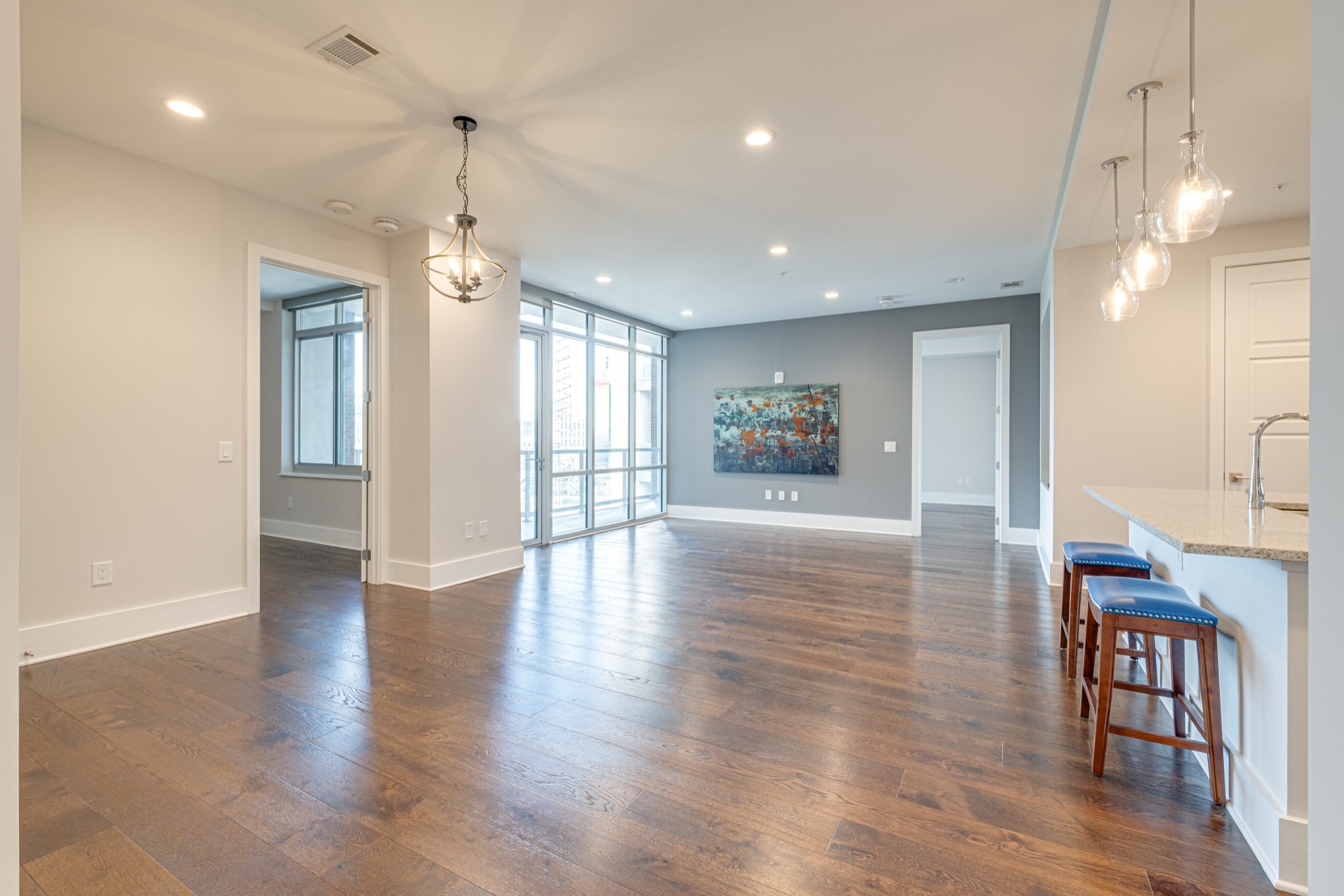20 Rutledge Street, Unit 406 Nashville, TN 37210 - Photo 17 of 75 a view of a livingroom with furniture window and wooden floor