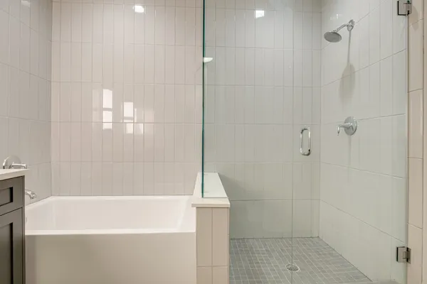 a room with pool table and wooden floor