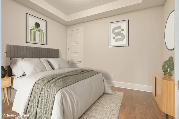 a room with gym equipment and large mirror