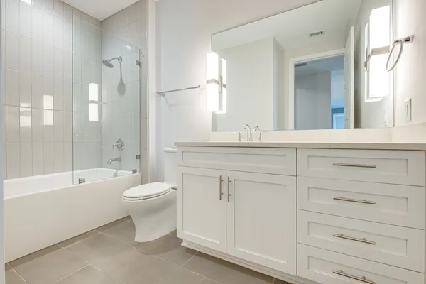 a view of a patio with couches chairs and a fire pit