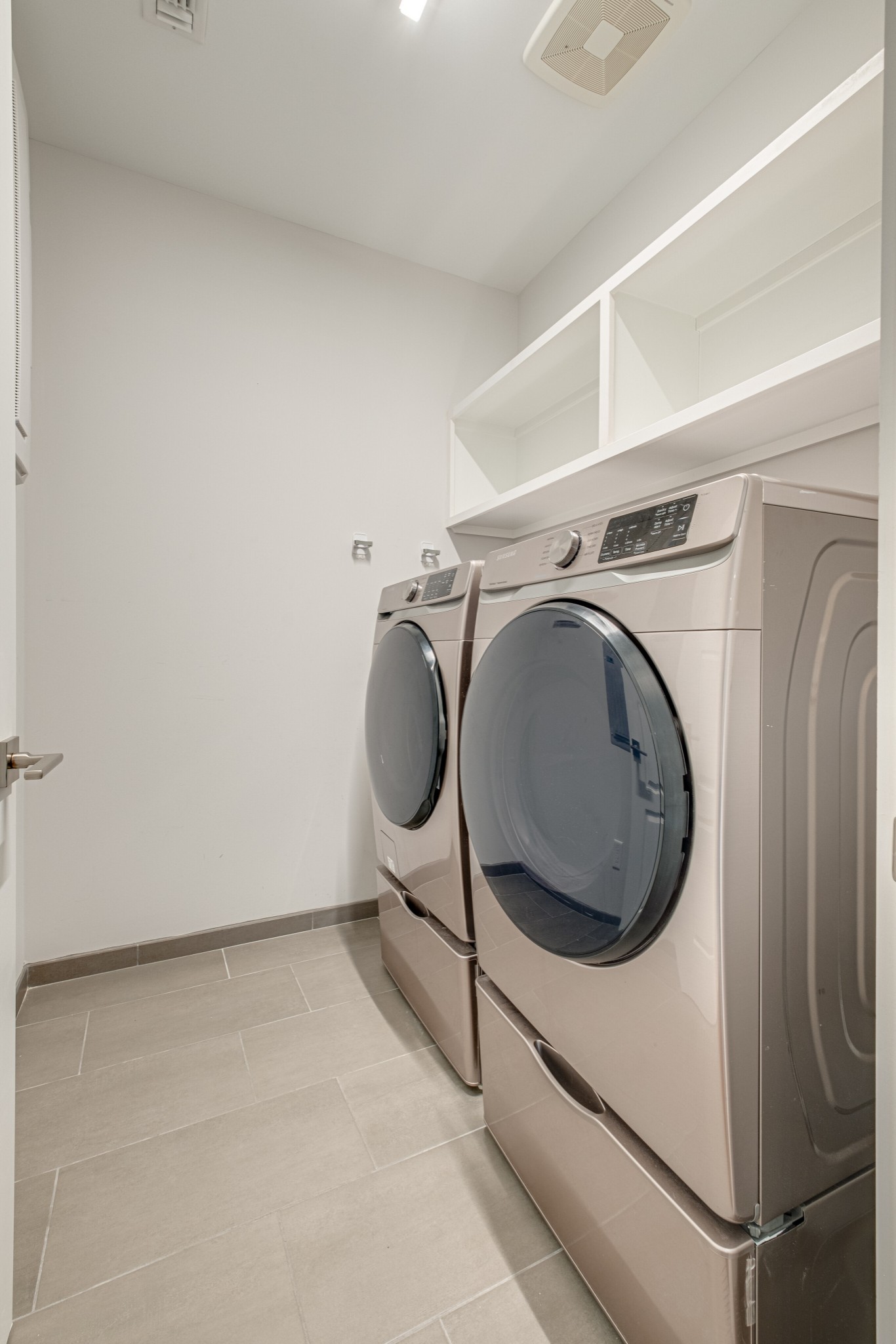 20 Rutledge Street, Unit 406 Nashville, TN 37210 - Photo 36 of 75 a utility room with dryer and washer