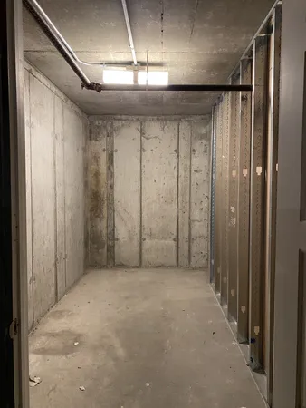 a view of a building with sitting area