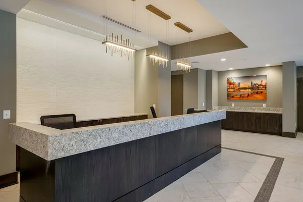 a view of a building with sitting area