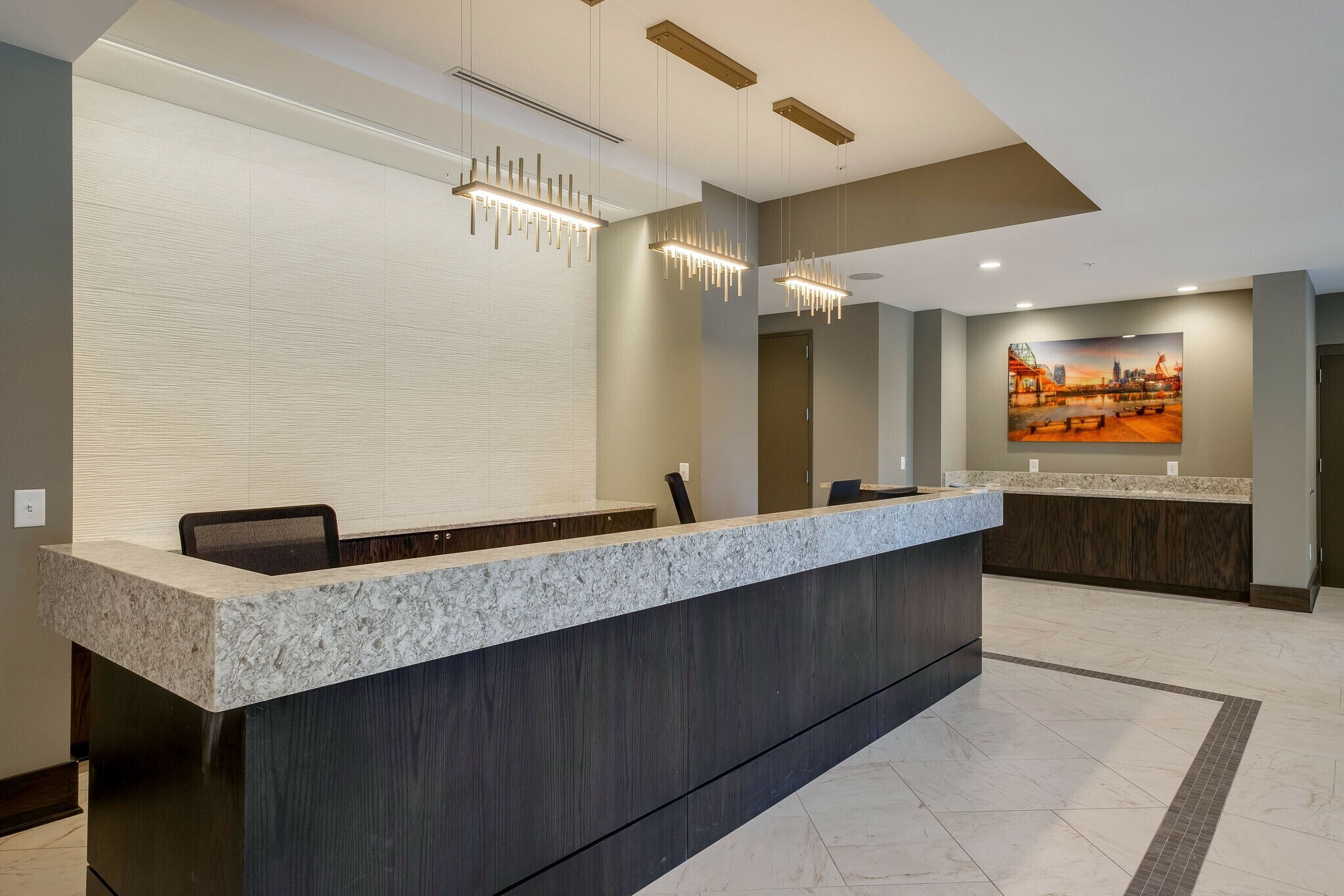 20 Rutledge Street, Unit 406 Nashville, TN 37210 - Photo 39 of 75 a living room with granite countertop furniture and a flat screen tv