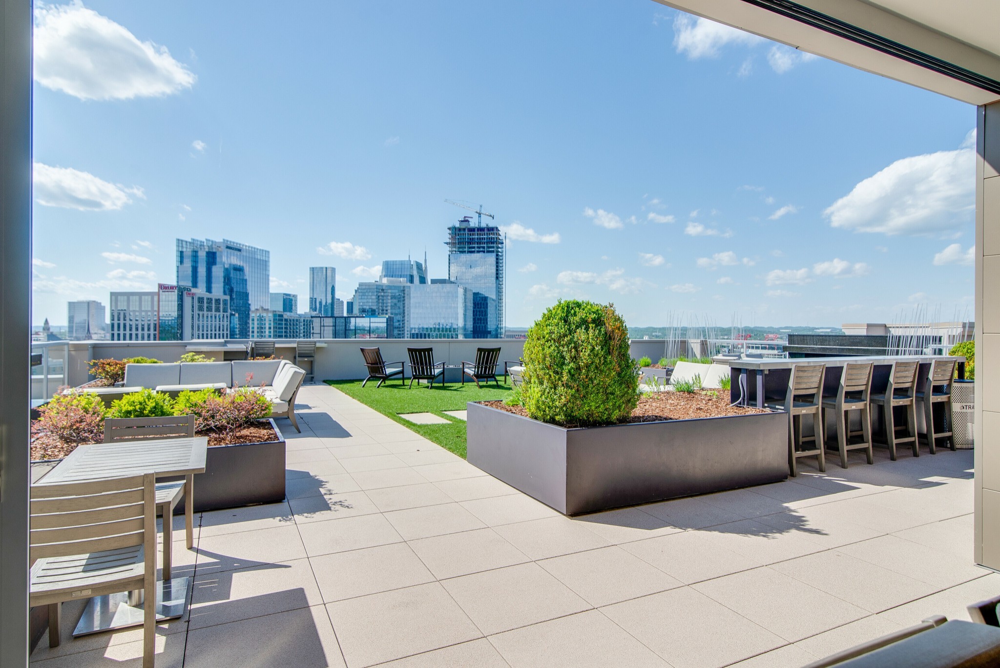 20 Rutledge Street, Unit 406 Nashville, TN 37210 - Photo 57 of 75 a view of a terrace with sitting area