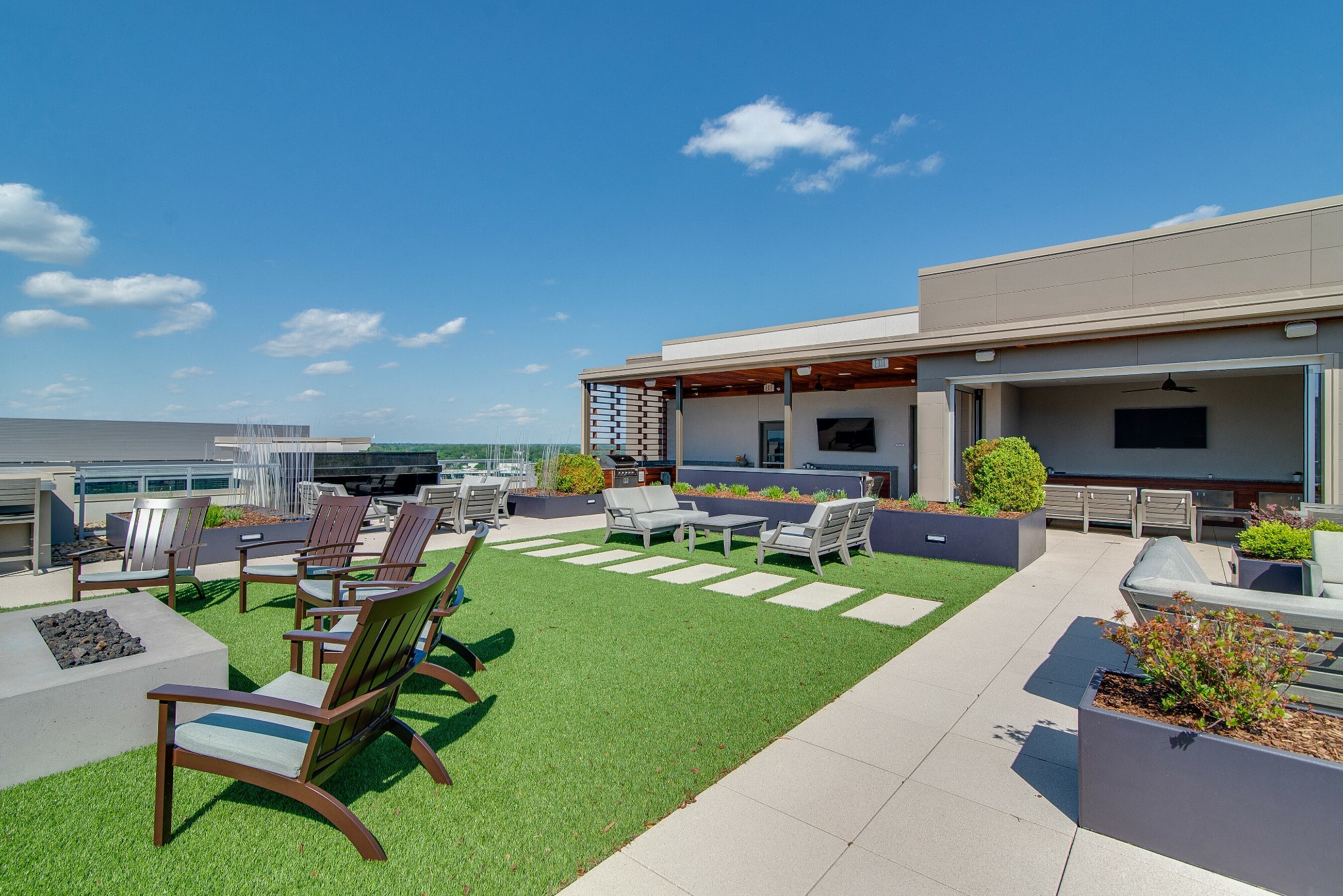 20 Rutledge Street, Unit 406 Nashville, TN 37210 - Photo 58 of 75 a view of a house with backyard porch and sitting area