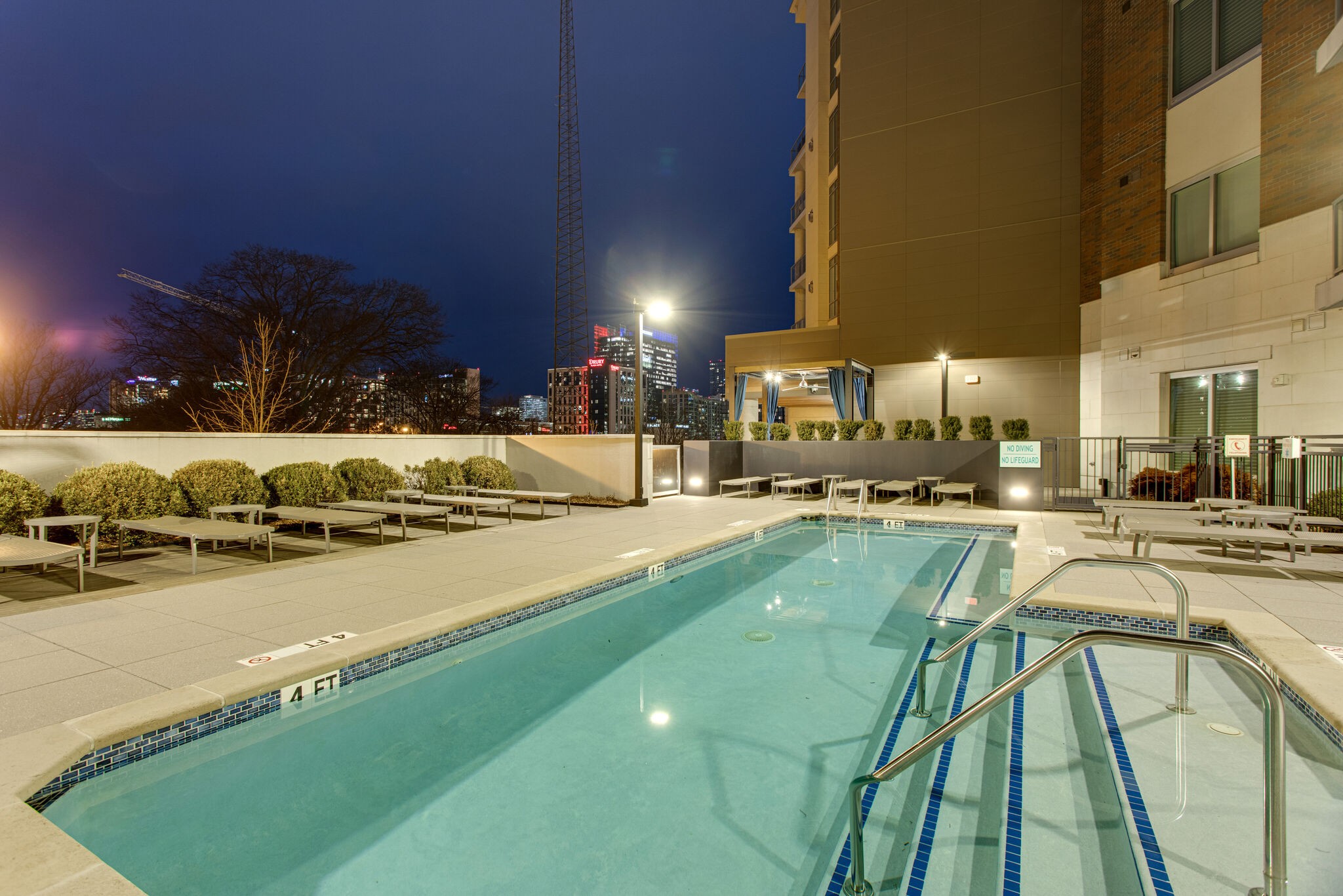20 Rutledge Street, Unit 406 Nashville, TN 37210 - Photo 74 of 75 a view of a swimming pool with outdoor seating
