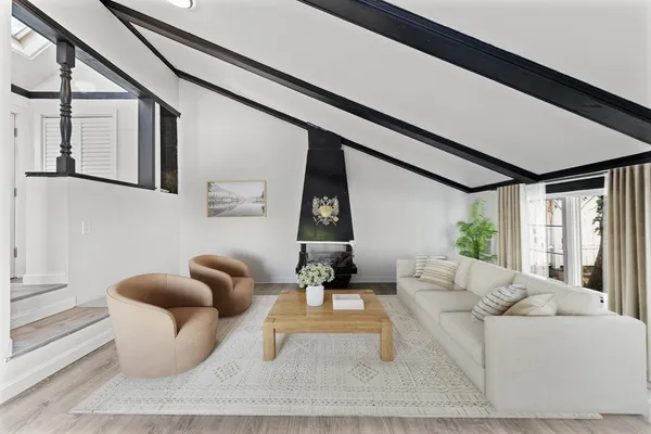 a bedroom with a bed and a table