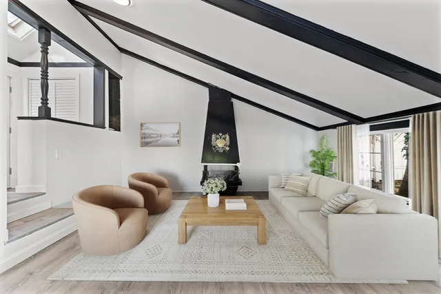 a bedroom with a bed and a table