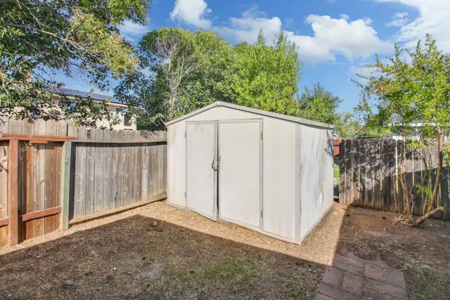 a backyard of a house with lots of green space