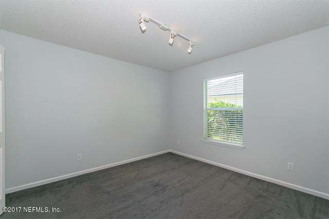 1753 Keswick Road St. Augustine, FL 32084 - Photo 13 of 26 an empty room with a window