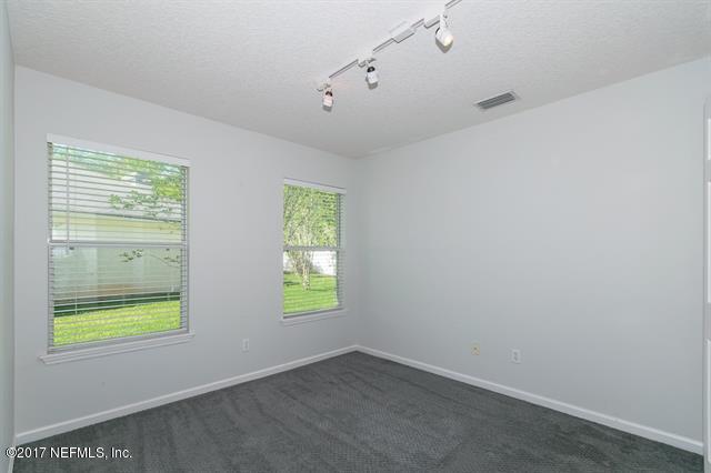1753 Keswick Road St. Augustine, FL 32084 - Photo 16 of 26 an empty room with a window