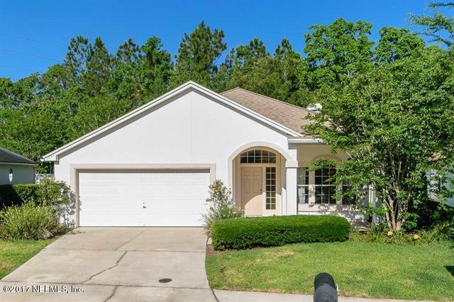 1753 Keswick Road St. Augustine, FL 32084 - Photo 22 of 26 a front view of a house with a yard