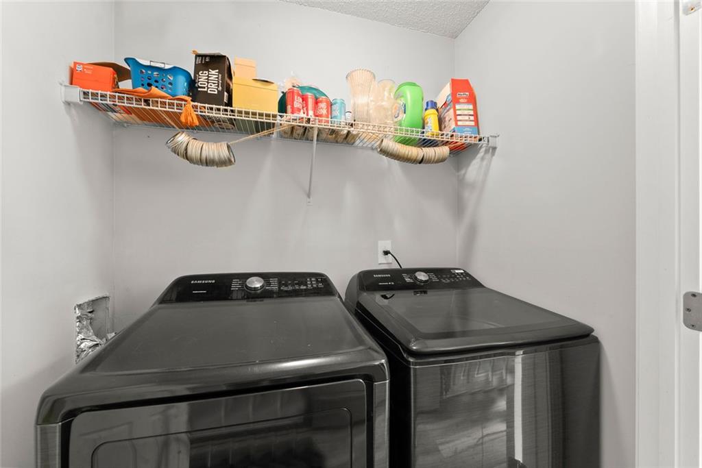 654 Marigold Lane Mount Airy, GA 30563 - Photo 11 of 27 a utility room with dryer and washer