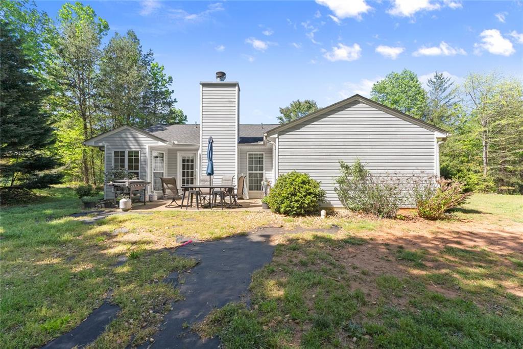 654 Marigold Lane Mount Airy, GA 30563 - Photo 23 of 27 a front view of a house with a yard