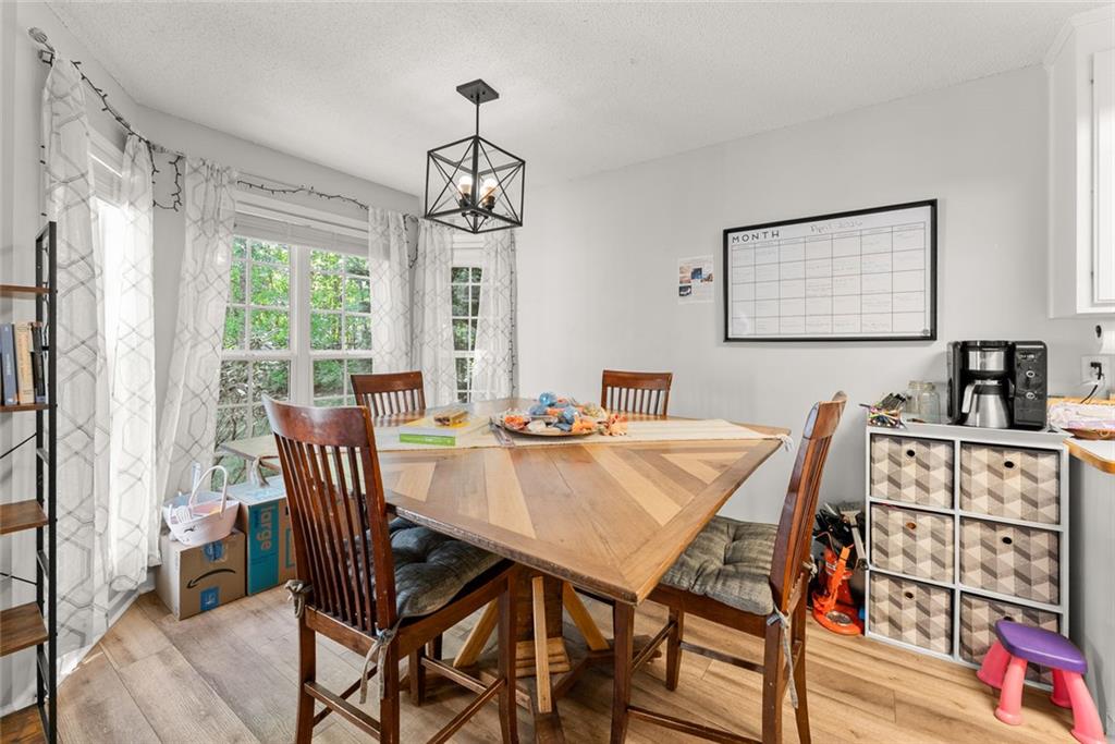 654 Marigold Lane Mount Airy, GA 30563 - Photo 7 of 27 a view of a dining room with furniture window and outside view