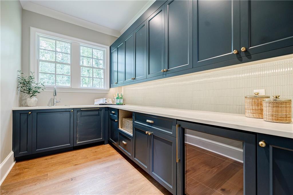 125 Laurel Brk Lane Canton, GA 30115 - Photo 14 of 50 a kitchen with stainless steel appliances granite countertop a sink window and cabinets