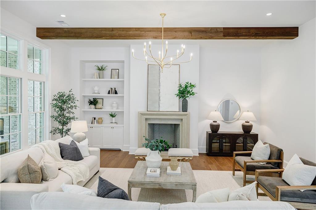 125 Laurel Brk Lane Canton, GA 30115 - Photo 16 of 50 a living room with furniture and a fireplace