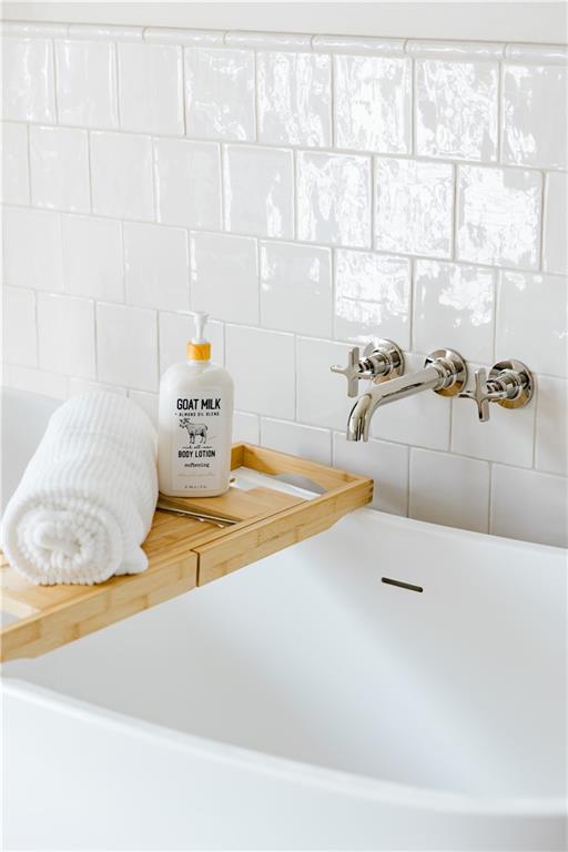 125 Laurel Brk Lane Canton, GA 30115 - Photo 23 of 50 a bathroom with a tub and sink
