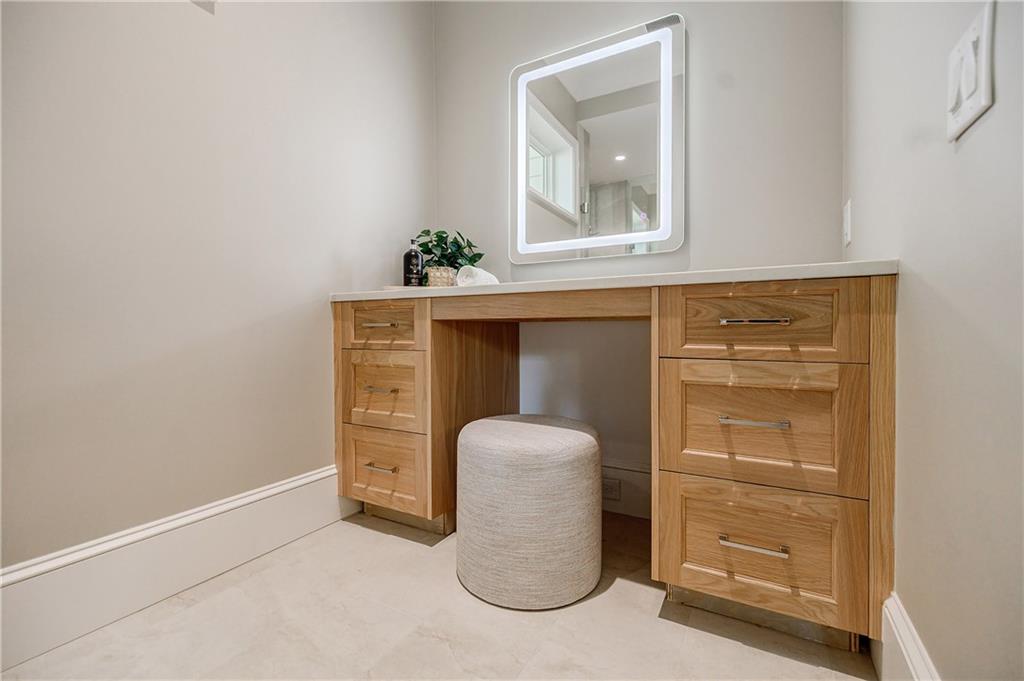 125 Laurel Brk Lane Canton, GA 30115 - Photo 24 of 50 a room with closet and wooden door