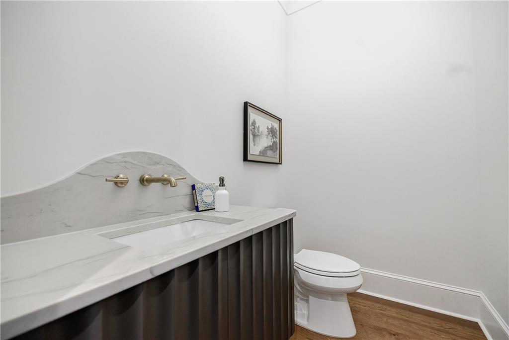 125 Laurel Brk Lane Canton, GA 30115 - Photo 26 of 50 a bathroom with a sink and a toilet