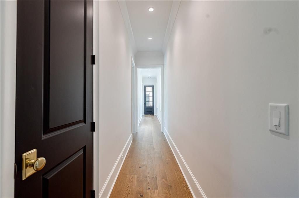 125 Laurel Brk Lane Canton, GA 30115 - Photo 27 of 50 a view of a hallway with wooden floor and staircase