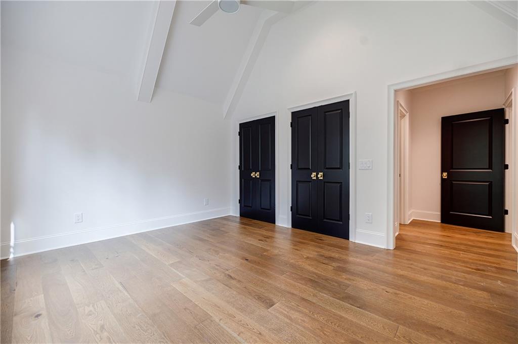 125 Laurel Brk Lane Canton, GA 30115 - Photo 36 of 50 a view of an empty room with wooden floor