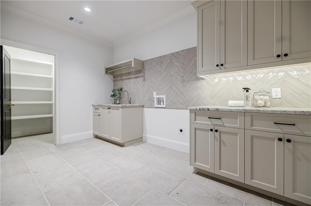 125 Laurel Brk Lane Canton, GA 30115 - Photo 42 of 50 a kitchen with cabinets and window