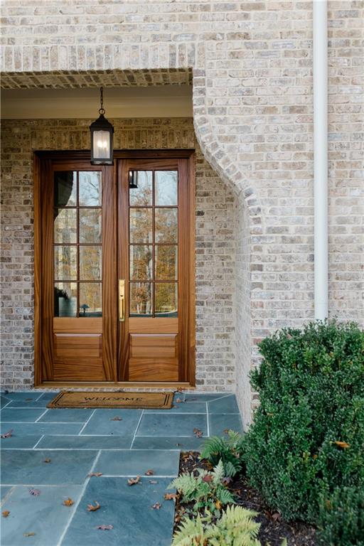 125 Laurel Brk Lane Canton, GA 30115 - Photo 45 of 50 a front view of a house with a yard