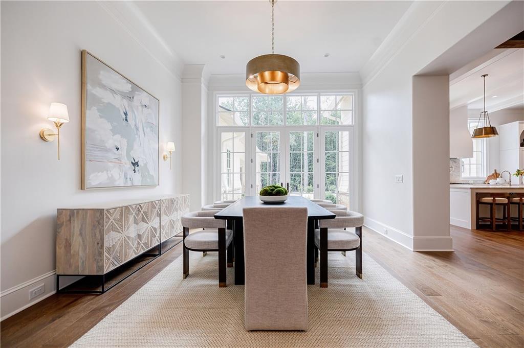 125 Laurel Brk Lane Canton, GA 30115 - Photo 5 of 50 a view of a dining room with furniture window and wooden floor