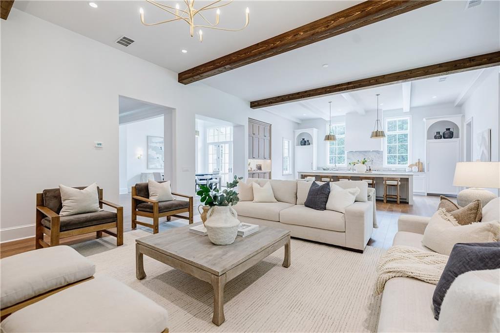 125 Laurel Brk Lane Canton, GA 30115 - Photo 6 of 50 a living room with furniture and a large window