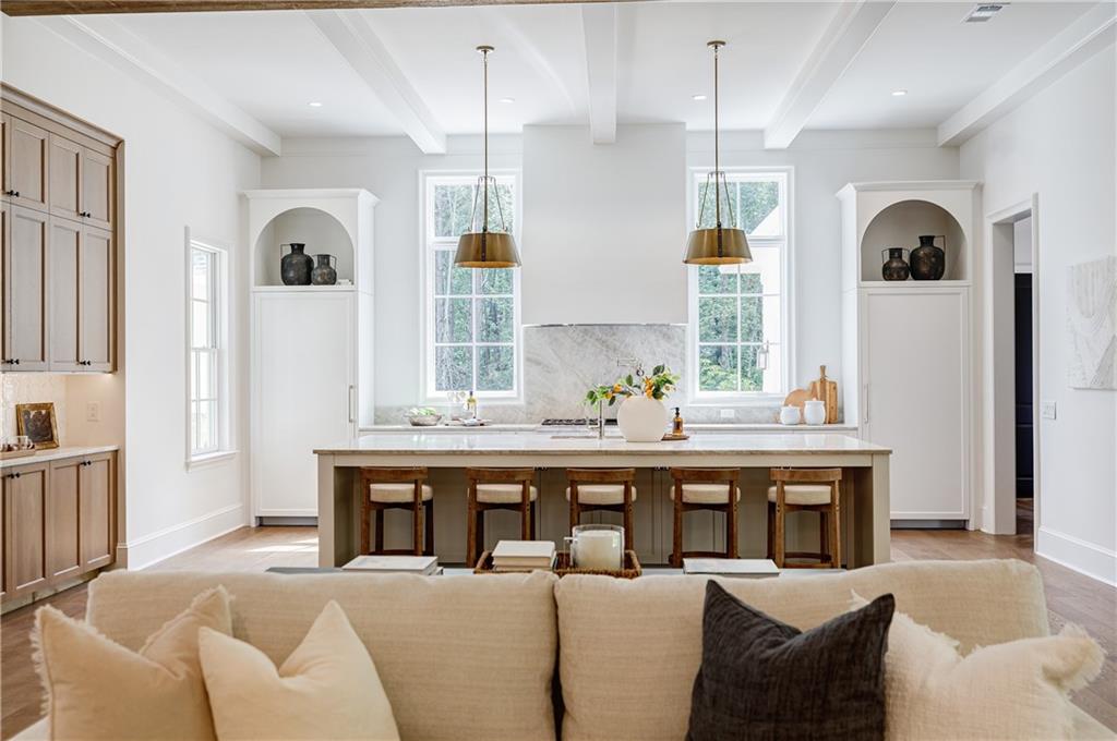 125 Laurel Brk Lane Canton, GA 30115 - Photo 7 of 50 a living room with furniture a window and kitchen view