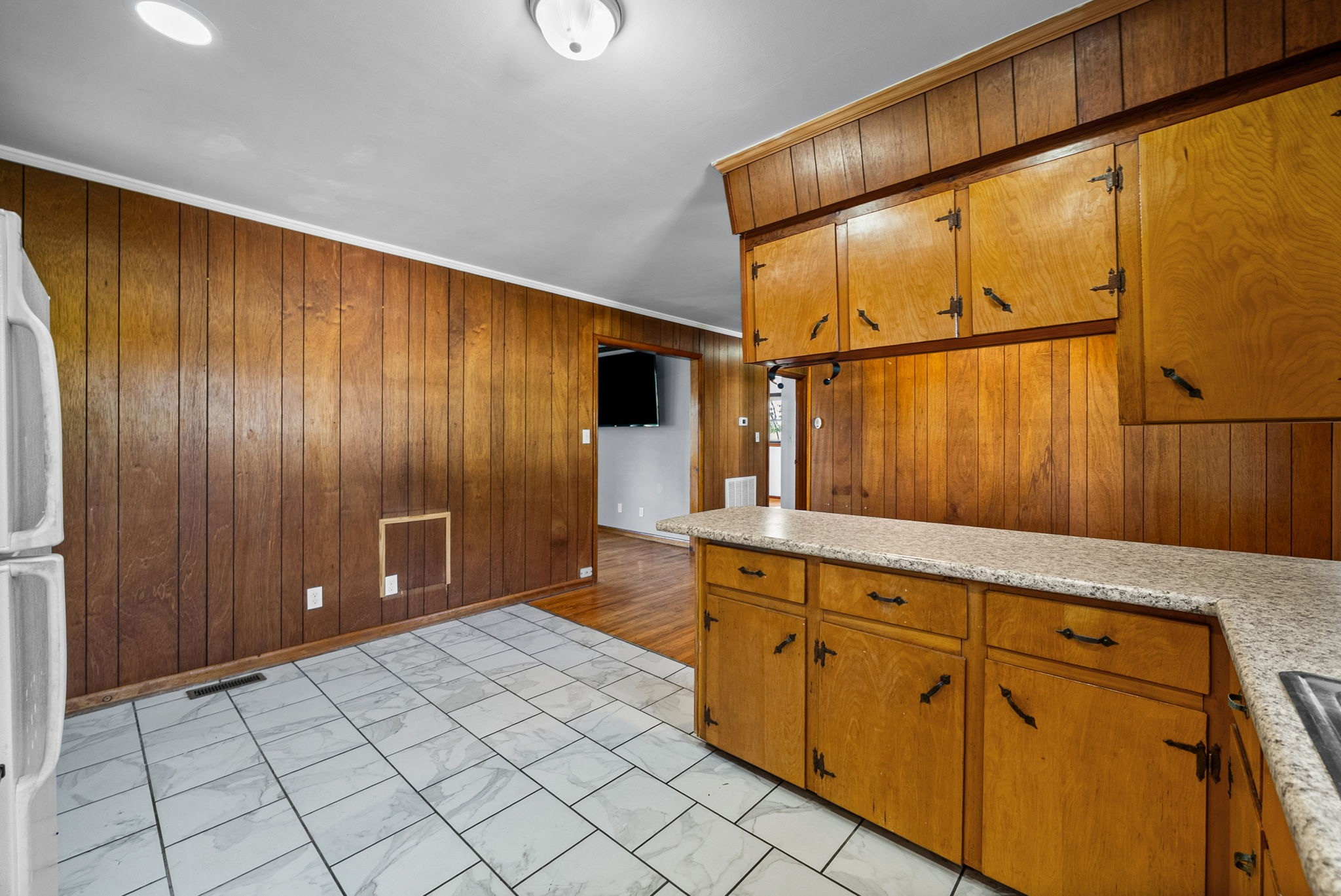 360 North Main Street Erin, TN 37061 - Photo 11 of 22 a spacious bathroom with a granite countertop sink and a mirror