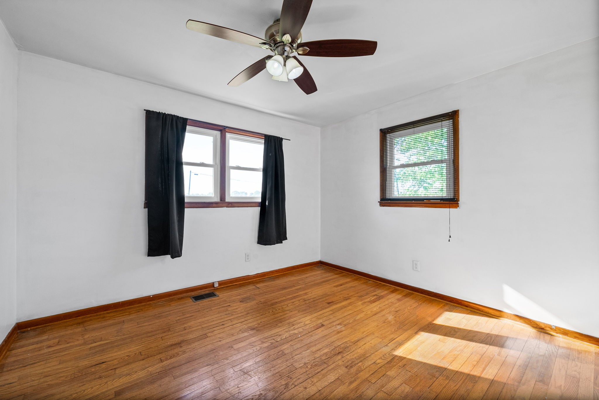 360 North Main Street Erin, TN 37061 - Photo 13 of 22 a view of an empty room with a window