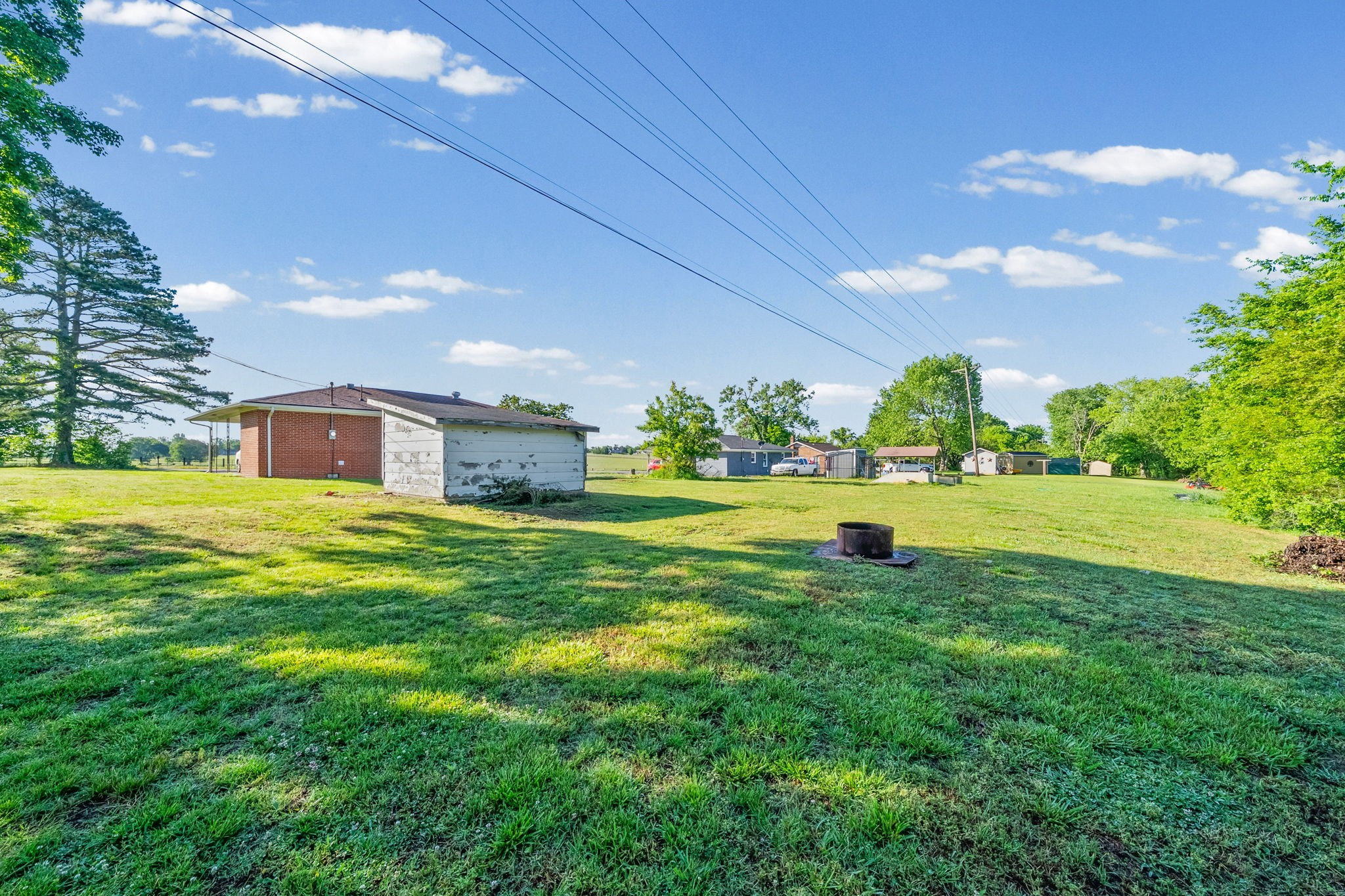 360 North Main Street Erin, TN 37061 - Photo 22 of 22 a house view with swimming pool and garden space