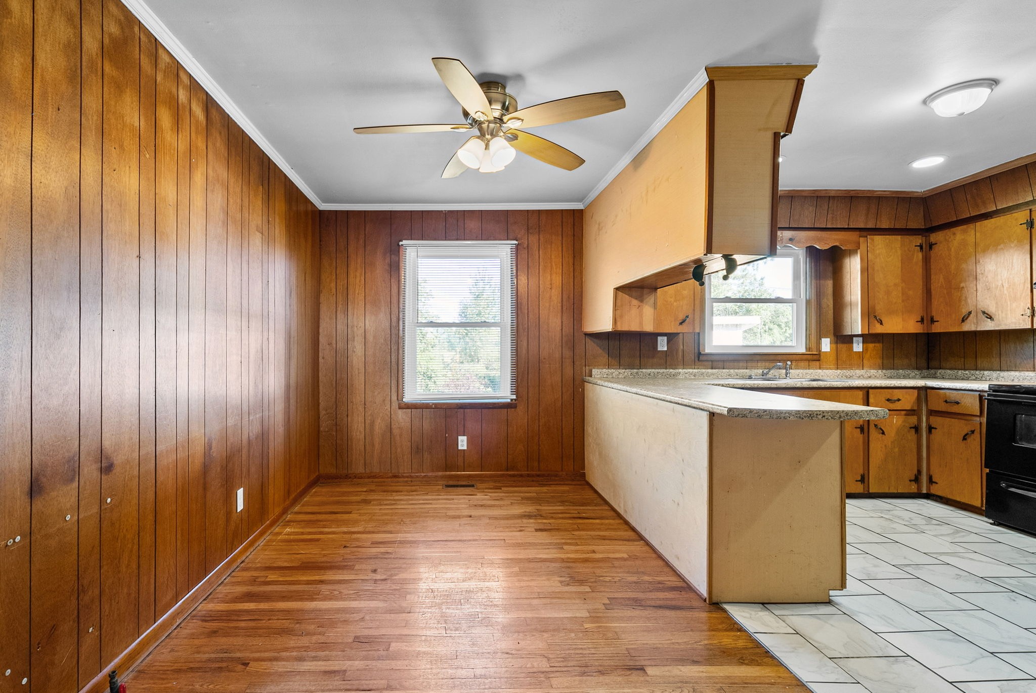 360 North Main Street Erin, TN 37061 - Photo 7 of 22 a kitchen with a refrigerator and a sink