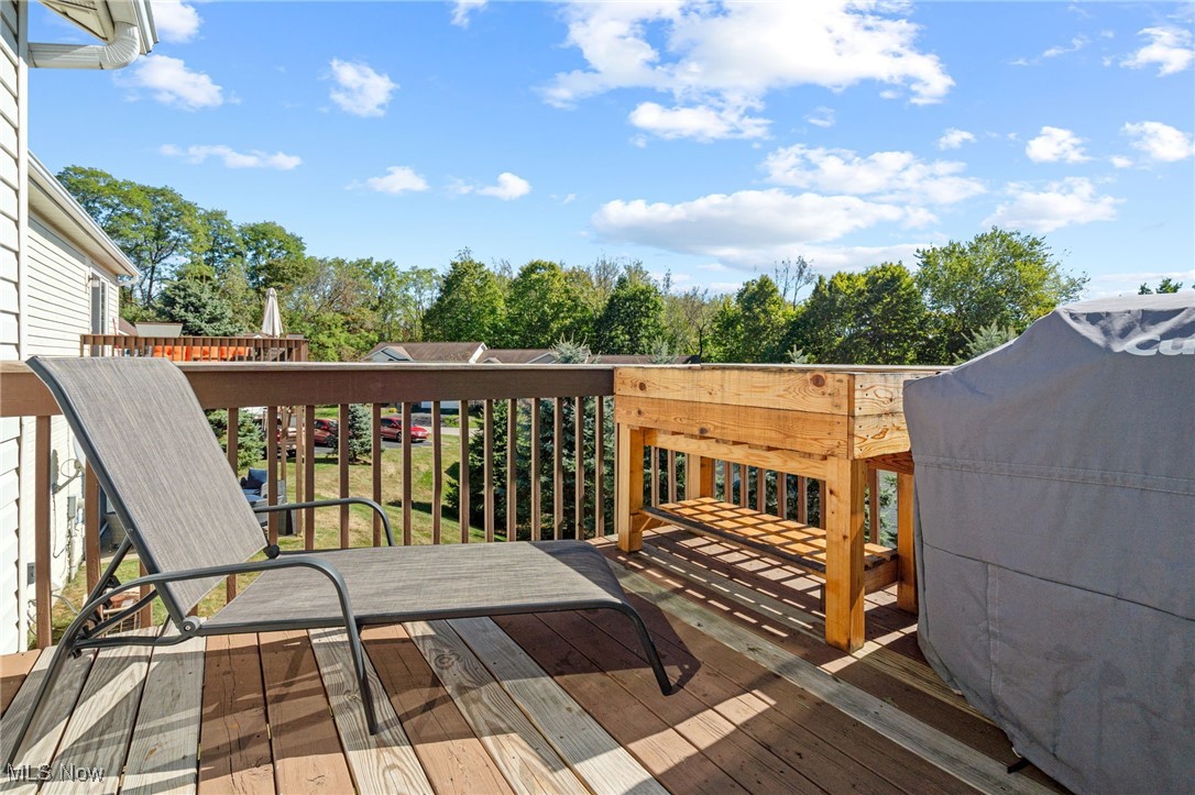 64 River Ridge Lane Munroe Falls, OH 44262 - Photo 21 of 25 Wooden terrace featuring view of scattered trees