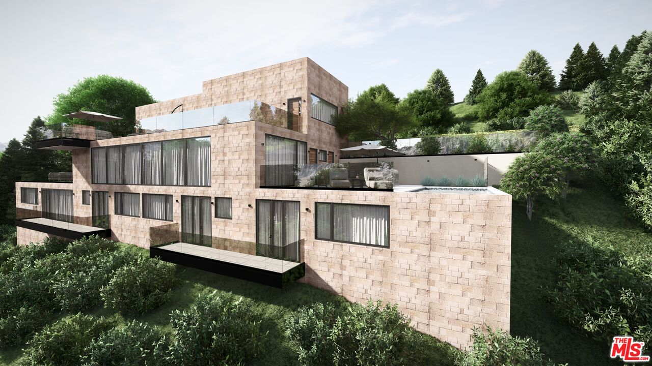 7315 Pyramid Place Los Angeles, CA 90046 - Photo 14 of 14 a view of a house with roof deck and sitting area