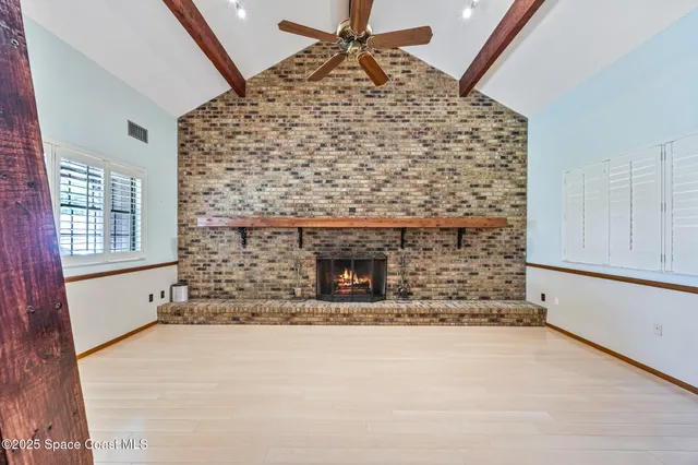 a living room with fireplace