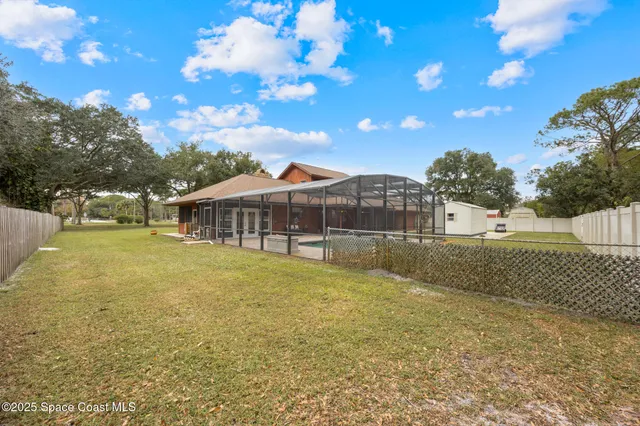 a view of a porch with wooden floor and outdoor space